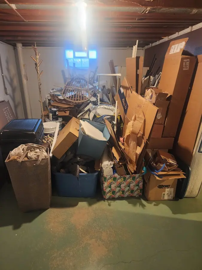 Roll-off dumpster container at job site for 15 Yard Dumpster Rental in Grosse Pointe